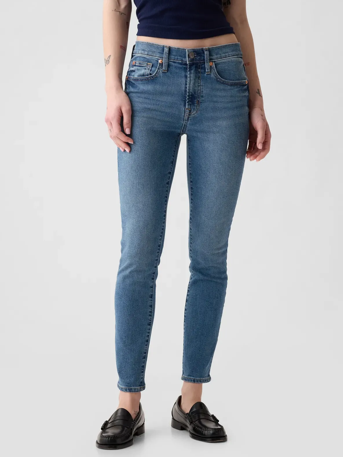 Mid Rise True Skinny Jeans